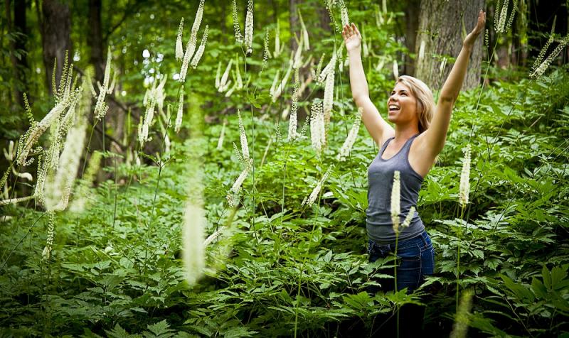 Woman Black Standing in Black Cohosh Forest